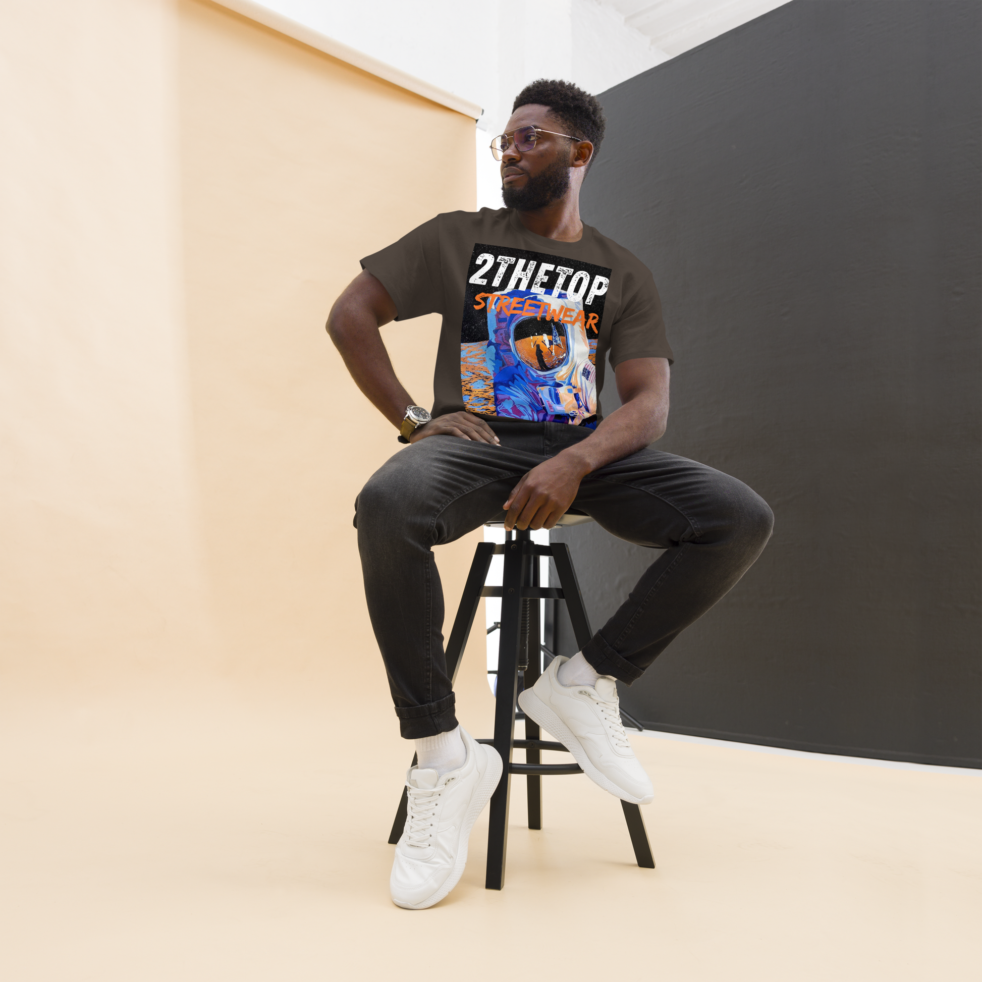 Urban streetwear graphics t-shirt with bold astronaut design on adult cotton tee
