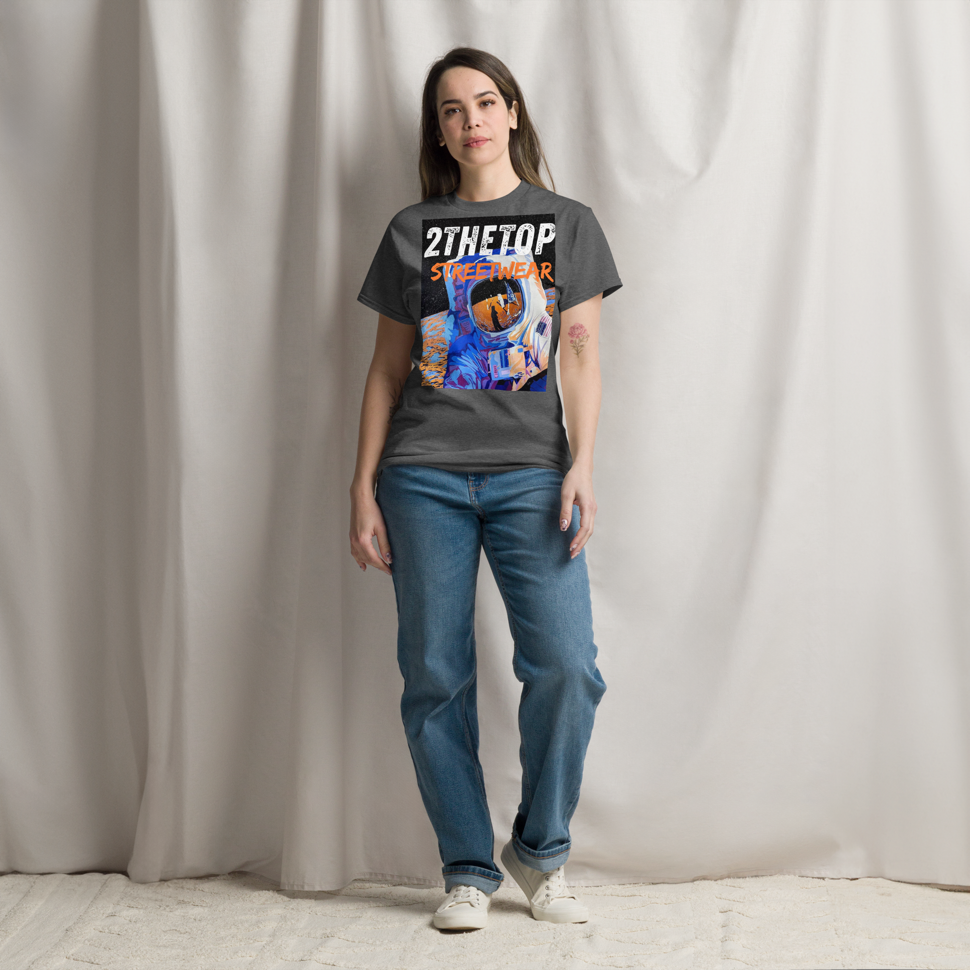 Men's graphics t-shirt featuring a bold astronaut design in urban streetwear style
